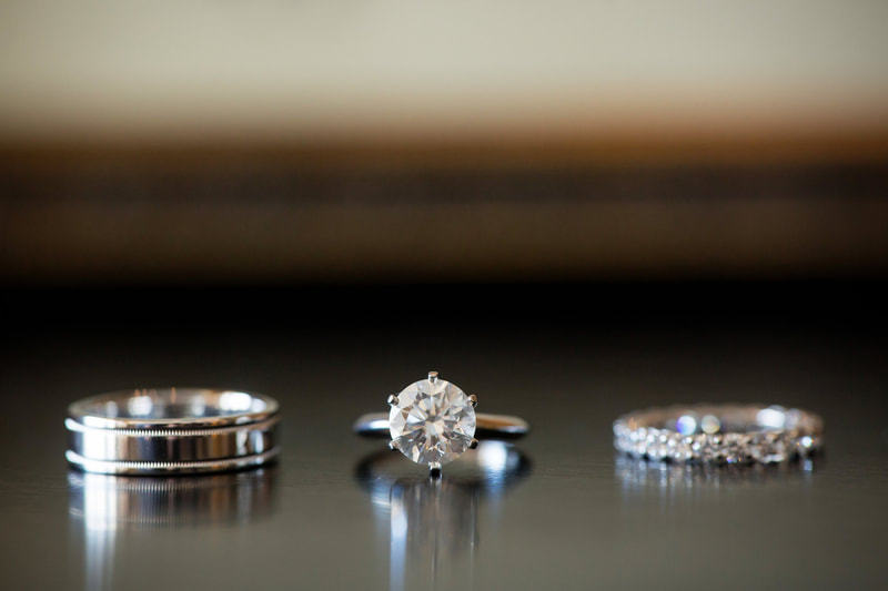 Close-up photo of three wedding rings at a Colorado wedding