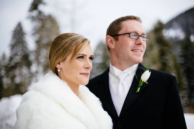 Bride and groom outside for their winter wedding