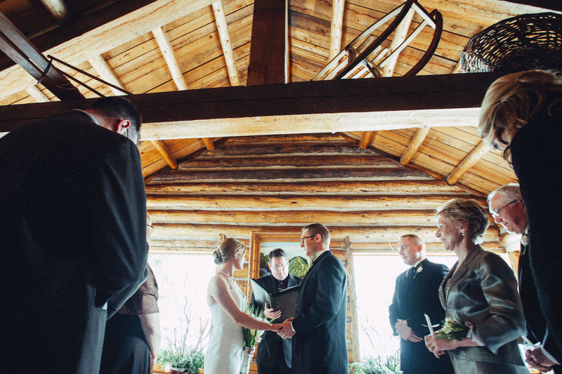 Wedding ceremony with bride, groom and officiant 