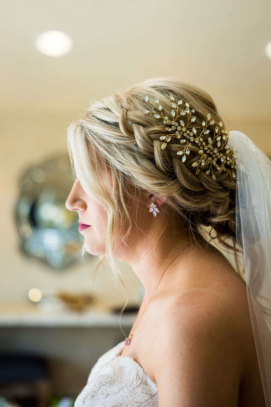Bride getting ready for her wedding at Cielo at Castle Pines
