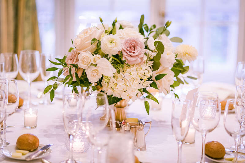 Ivory and blush roses for a classic wedding reception