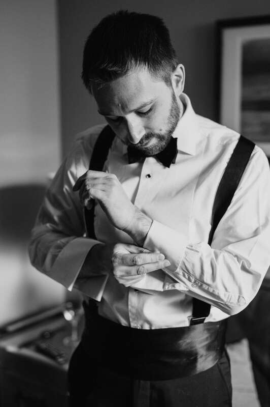 Groom getting ready for his wedding at the Oxford Hotel