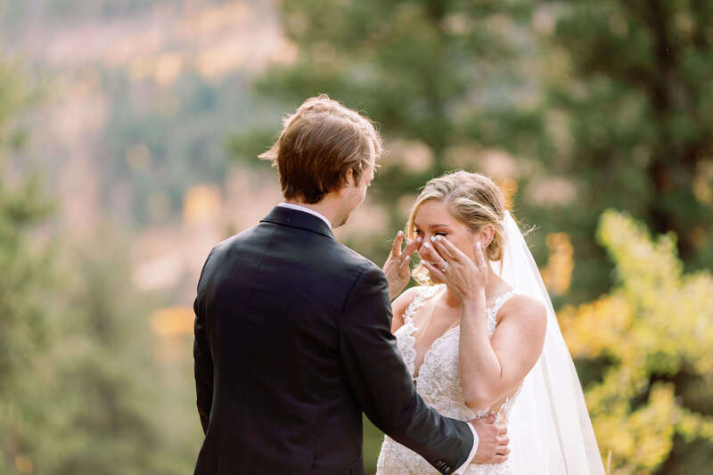 Bride and groom first look in Estes Park, Colorado. 