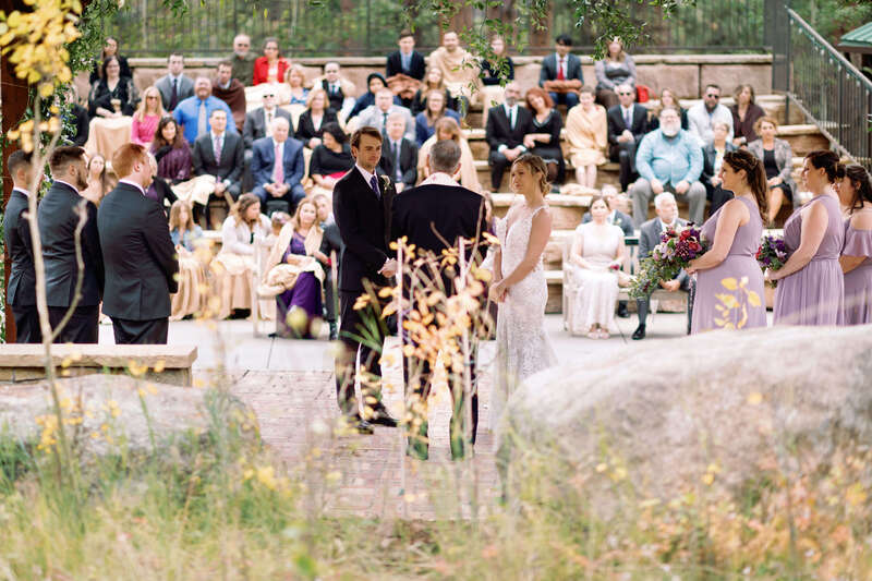 Wedding ceremony overlooking the Rocky Mountains at Della Terra Mountain Chateau