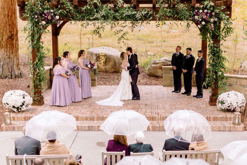 Wedding ceremony overlooking the Rocky Mountains at Della Terra Mountain Chateau