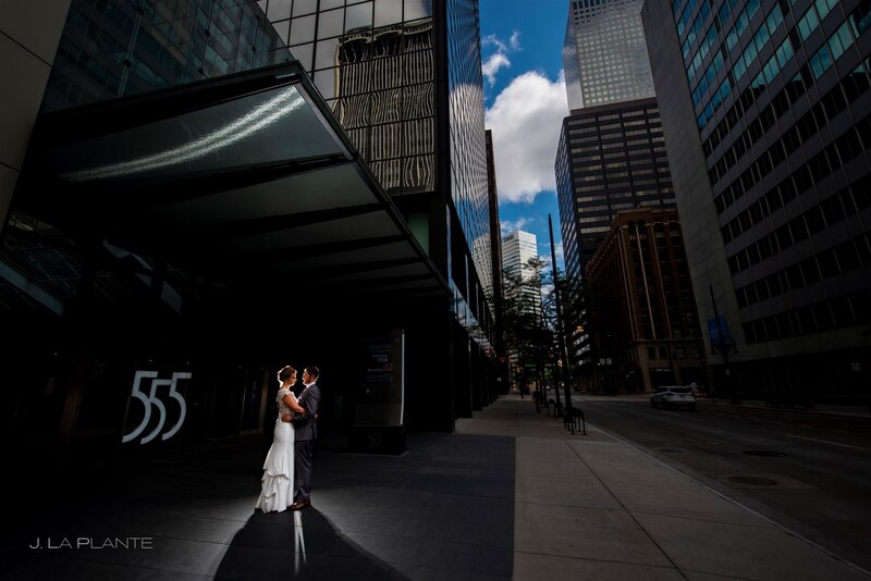 downtown denver street with focus on the bride and groom