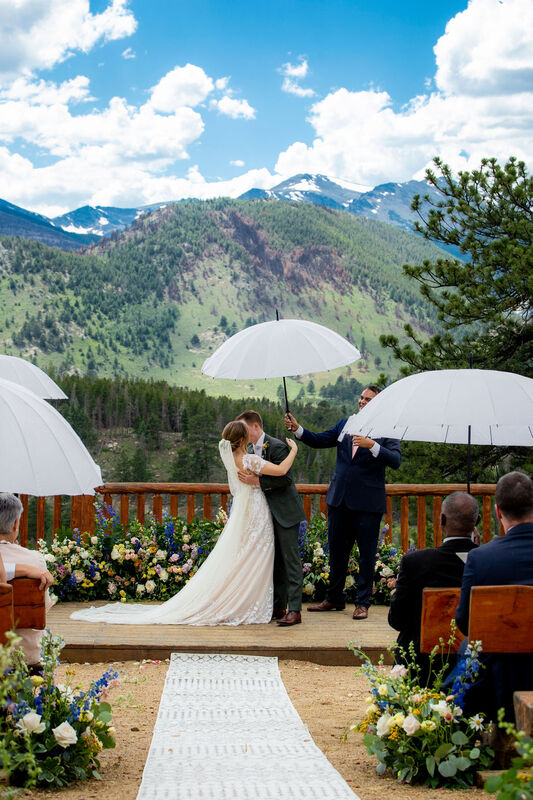 Outdoor wedding ceremony at the YMCA of the Rockies Overlook Chapel