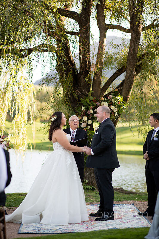 Wedding ceremony overlooking The Fish House pond at The Broadmoor