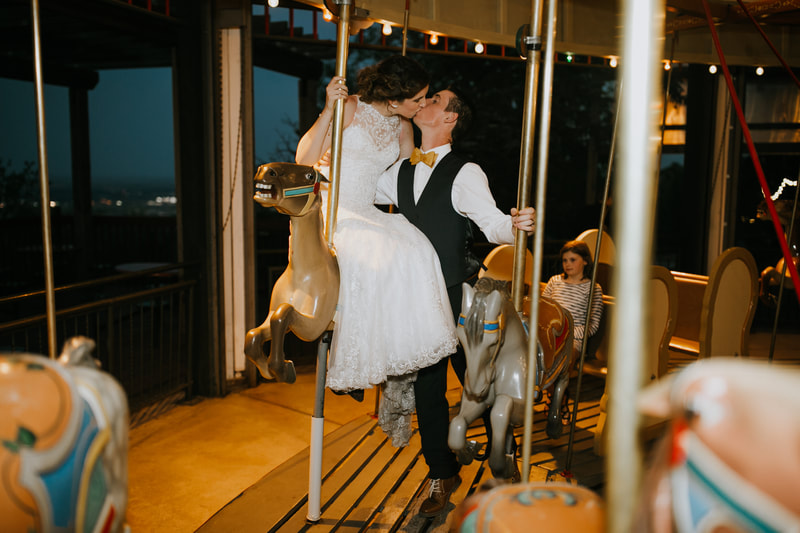 Colorado carousel wedding kiss photos, Colorado Springs carousel wedding kiss photos, carousel wedding kiss photos