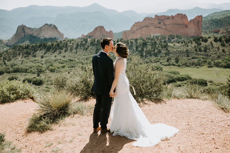 Colorado Springs Wedding Bride and Groom Kiss, Bride and Groom Outdoors Kiss, Bride and Groom with Mountains Kiss