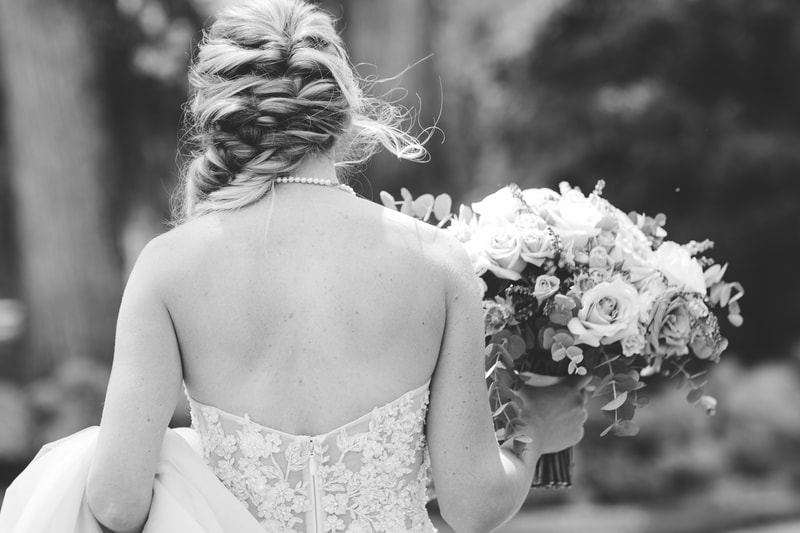 black and white photo of bride and bridal bouquet